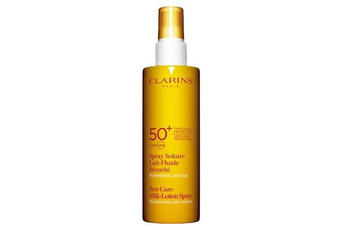 Сонцезахисний молочко-спрей для обличчя і тіла Spray Solaire Lait-Fluide SPF 50, Clarins